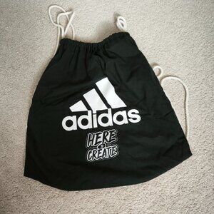 Black Adidas sportswear drawstring bag